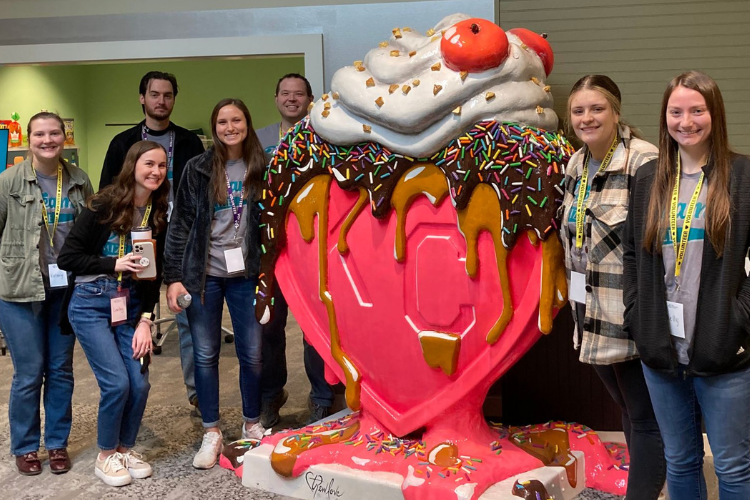 Mize Culture: Team Mize poses with a KC Sundae Heart outside of JA Town